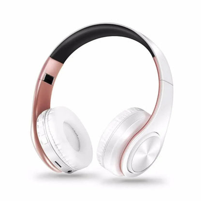 Stevvex over-ear wireless Bluetooth headphones with white cups and rose-gold frame, foldable on Tampa Home & Garden Store