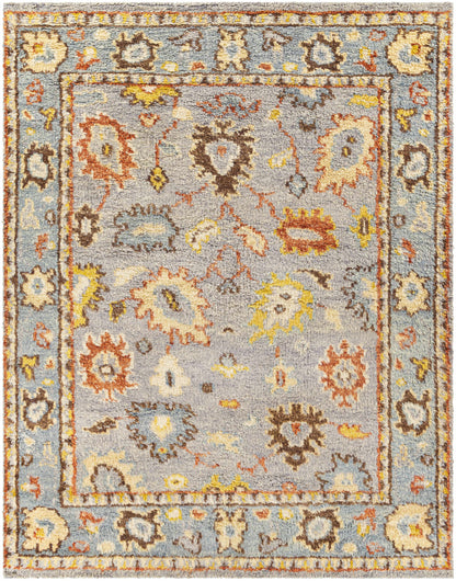 Suisun Premium Rug by Boutique Rugs, blue-gray oriental rug with yellow and orange floral motifs on Tampa Home & Garden Store