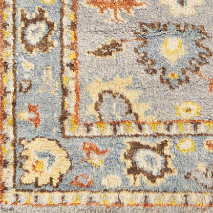 Suisun Premium Rug by Boutique Rugs, blue gray shag with ivory and yellow accents on Tampa Home & Garden Store