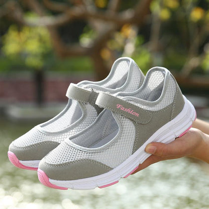 Stevvex white mesh espadrille sneakers pair with grey overlays, pink outsole, Velcro strap on Tampa Home & Garden Store