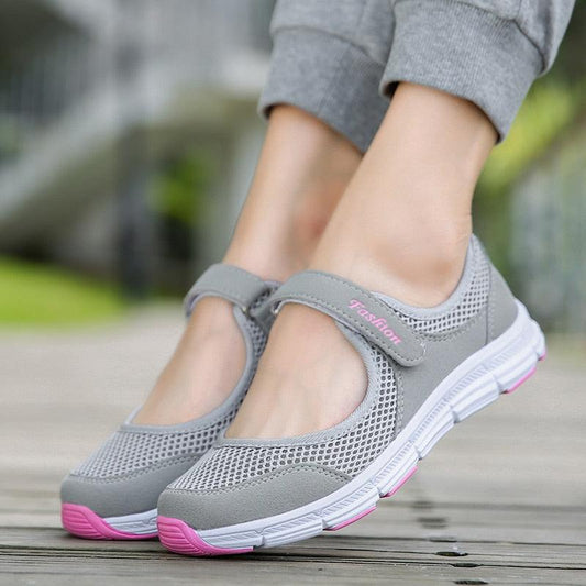 Women breathable mesh casual walking sneakers pair, gray mesh with pink outsole accents, Stevvex on Tampa Home & Garden Store