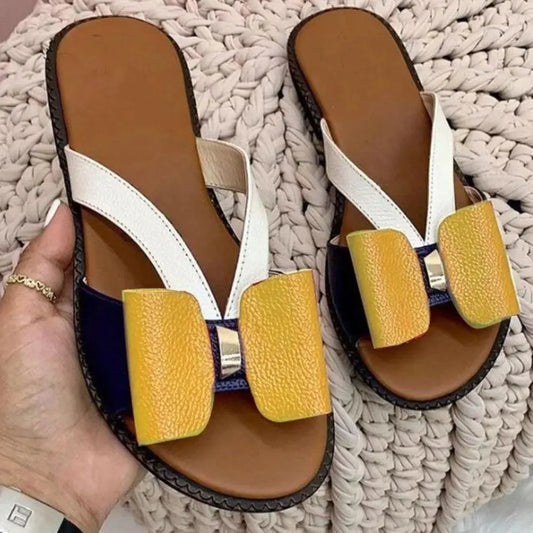 Stevvex Summer Butterfly sandals white T-strap with yellow bow fronts brown footbed, pair on Tampa Home & Garden Store
