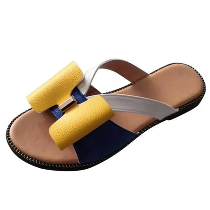 Summer butterfly sandals with yellow foam straps, blue accent, beige footbed and black sole on Tampa Home & Garden Store