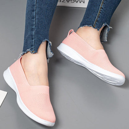 Stevvex pink knit slip-on sneakers pair, breathable mesh upper, white sole on Tampa Home & Garden Store