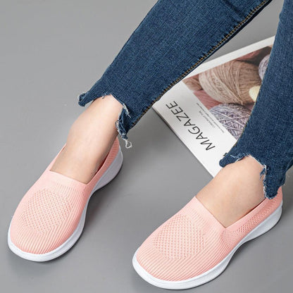 Stevvex slip-on sneakers in pink breathable mesh with white sole, casual footwear on Tampa Home & Garden Store