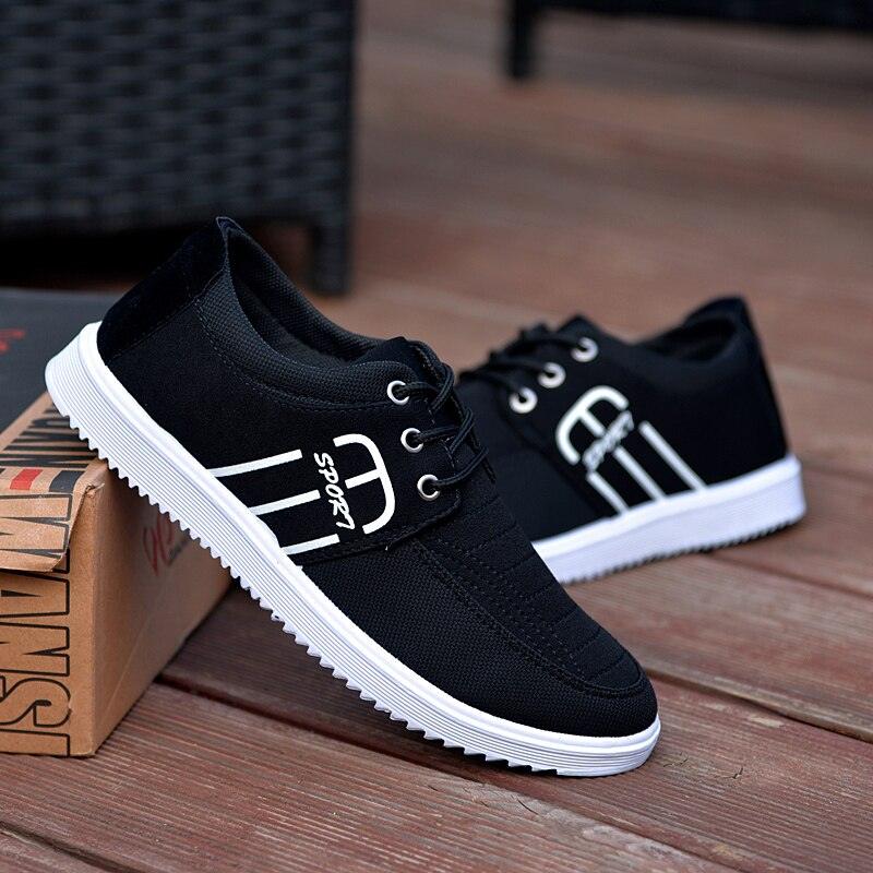 Stevvex black canvas sneakers, breathable casual shoes with white sole, pair on Tampa Home & Garden Store