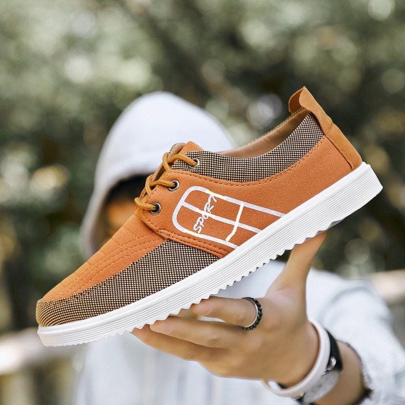 Stevvex men's orange canvas sneakers with white sole and checkered knit panels on Tampa Home & Garden Store