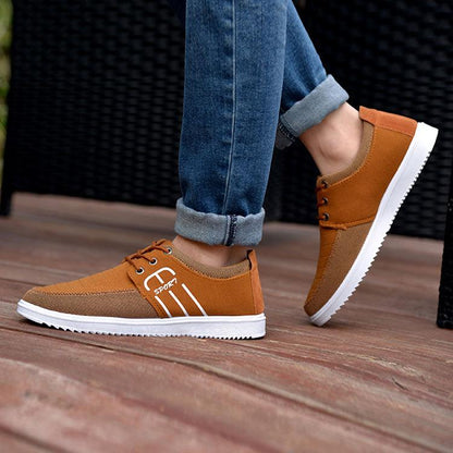 Stevvex men's casual sneakers pair in brown tan breathable canvas with white sole on Tampa Home & Garden Store
