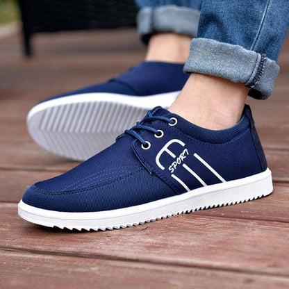 Stevvex navy blue canvas sneakers with white sole, SPORT logo and stripes, casual walking on Tampa Home & Garden Store