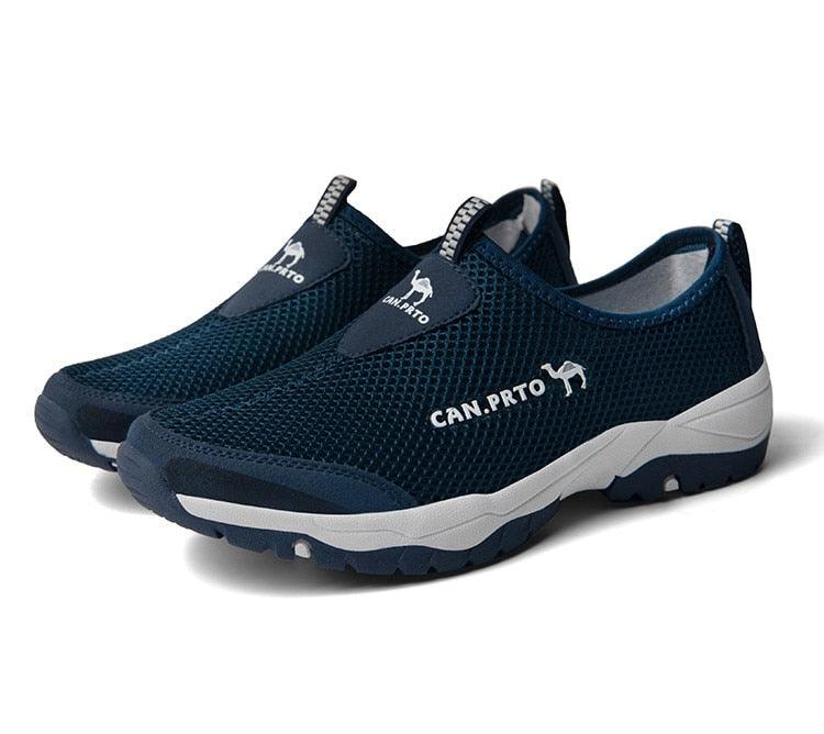 Stevvex navy blue mesh slip-on sneakers pair, lightweight walking shoes with rugged outsole on Tampa Home & Garden Store
