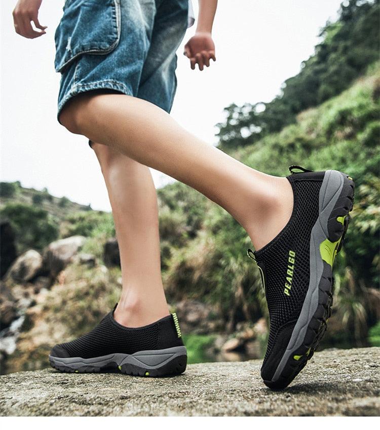 Stevvex black mesh slip-on sneakers with gray sole and lime accents for outdoor walking on Tampa Home & Garden Store