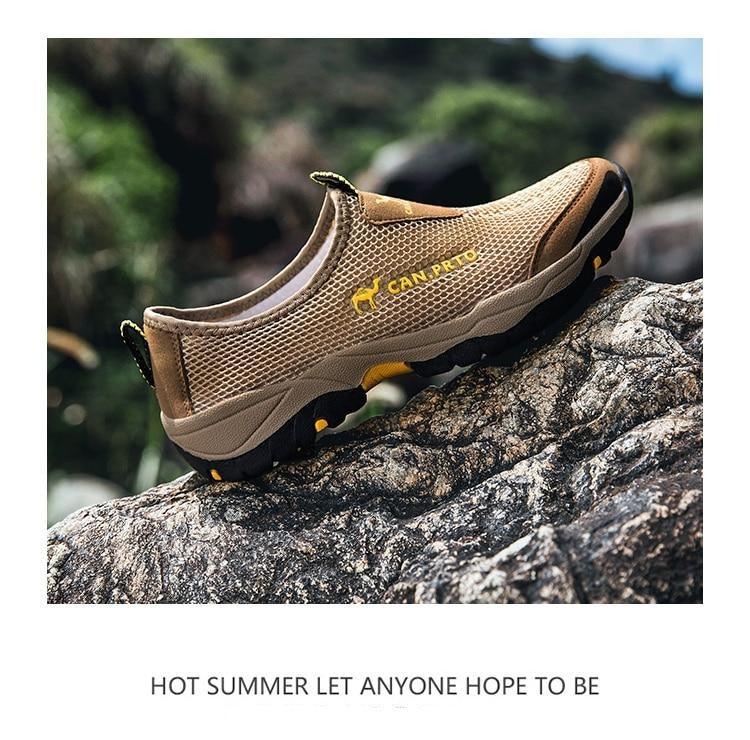 Stevvex tan mesh beach sneakers, lightweight breathable slip-on with rugged outsole on rock on Tampa Home & Garden Store