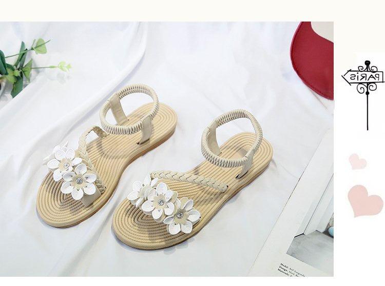 Stevvex women's flat sandals with elastic ankle strap and white floral on beige braided sole on Tampa Home & Garden Store