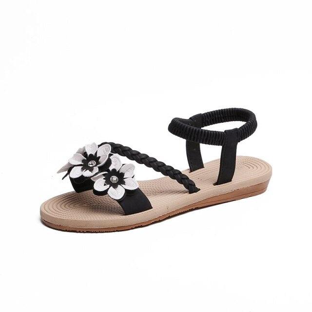 Stevvex women's flat sandal with floral and elastic ankle strap, black braided strap sole on Tampa Home & Garden Store