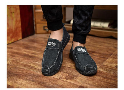 Stevvex men's slip-on canvas loafers pair in dark gray with white stitching on Tampa Home & Garden Store