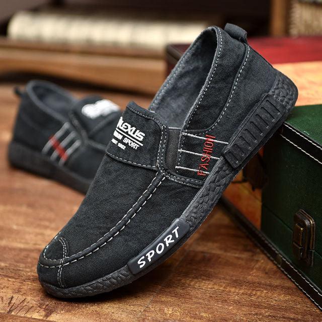 Stevvex men's slip-on canvas loafers in dark gray with white stitching and rubber sole on Tampa Home & Garden Store