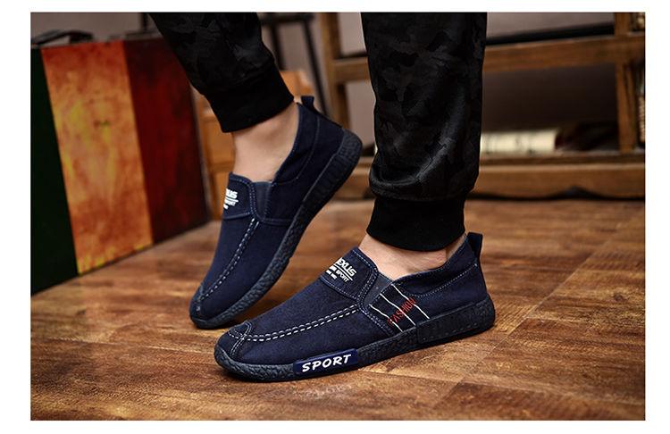 Stevvex men's navy blue canvas slip-on shoes with white stitching and sport branding on Tampa Home & Garden Store