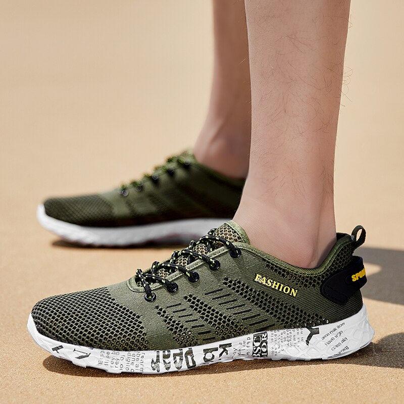 Stevvex Summer Sport Mens Sneakers olive green mesh upper black laces white foam sole pair on Tampa Home & Garden Store