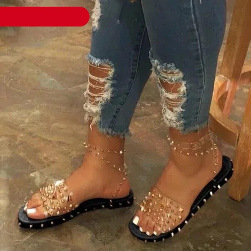 Stevvex transparent buckle strap sandals with studded nude straps and black sole, open toe on Tampa Home & Garden Store