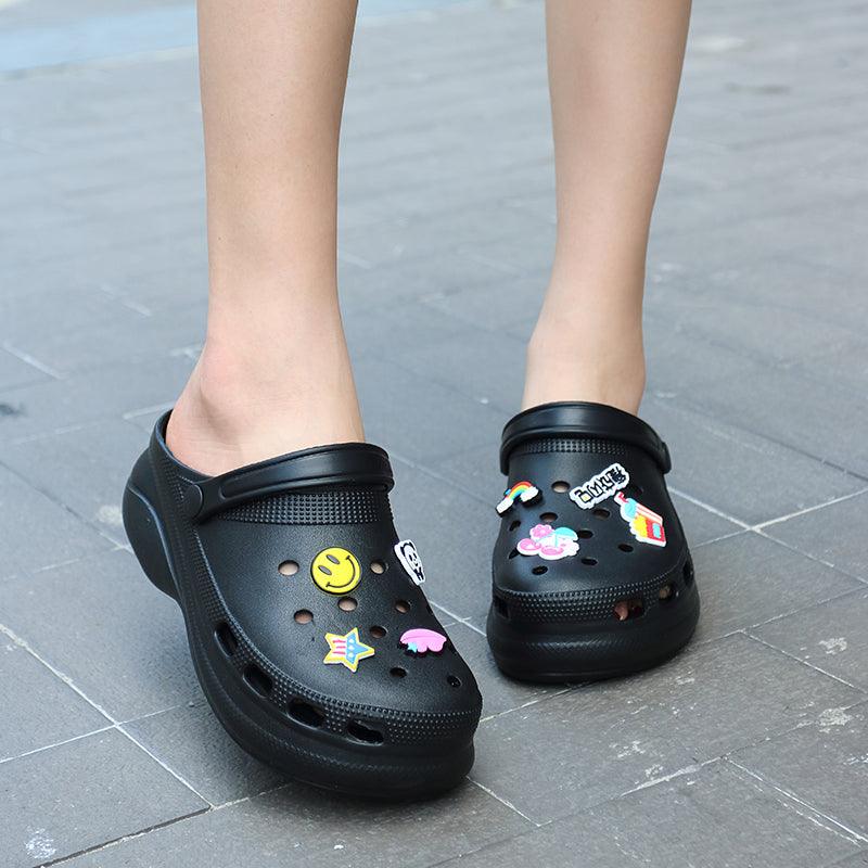 Stevvex black garden clogs pair with colorful patches; slip-on beach sandals for outdoor comfort on Tampa Home & Garden Store