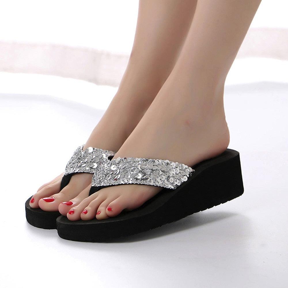 Flip-flop sandals by Stevvex with silver sequin strap and black platform sole on Tampa Home & Garden Store
