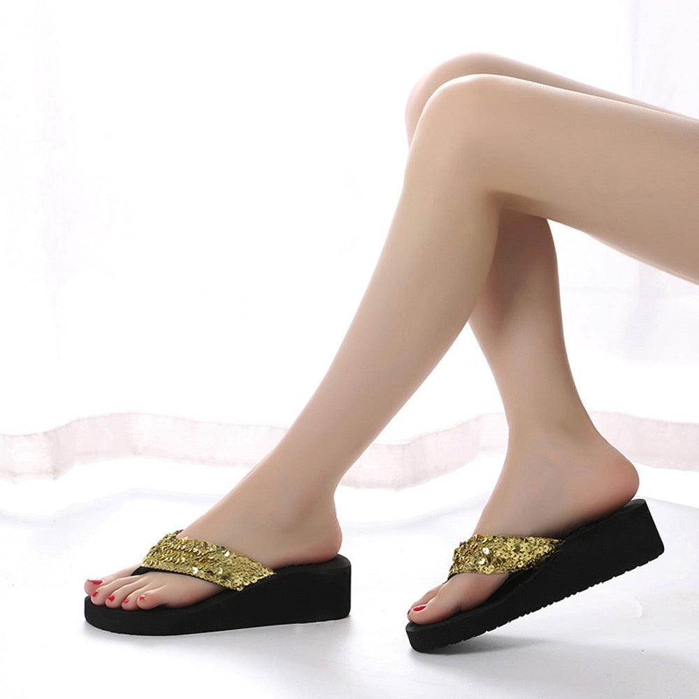Stevvex gold sequin flip flops pair, open-toe slides with black platform soles on Tampa Home & Garden Store