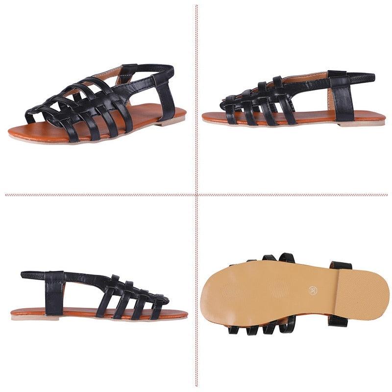 Stevvex women's black strappy flat sandals with open toe and adjustable ankle buckle on Tampa Home & Garden Store
