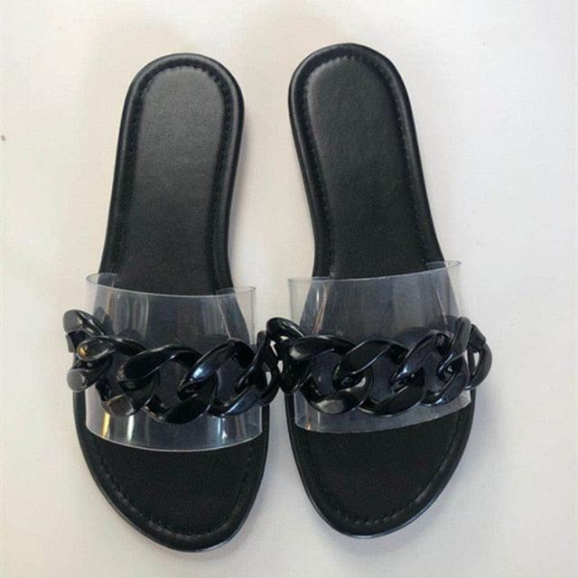 Stevvex black square-toe slide sandals pair with clear strap and chunky metal chain on Tampa Home & Garden Store