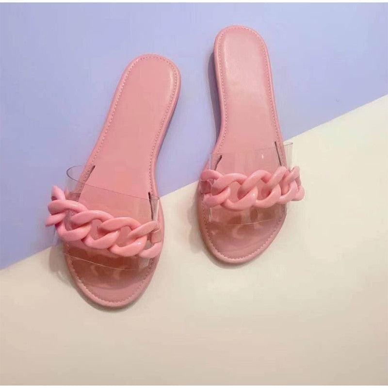 Stevvex pink women's flat slides with translucent strap and chunky pink chain across toe on Tampa Home & Garden Store