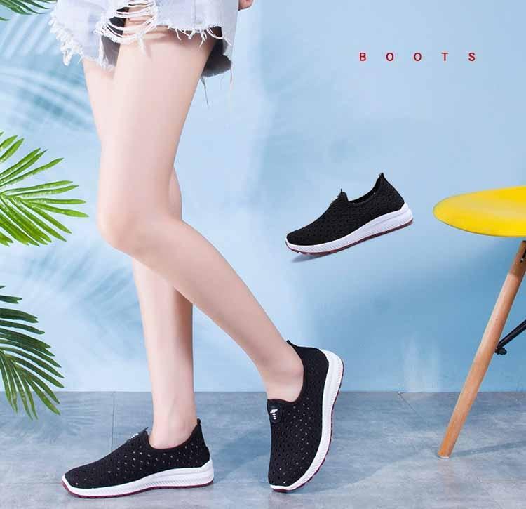 Stevvex black breathable mesh slip-on sneakers with white sole, two sneakers shown on Tampa Home & Garden Store