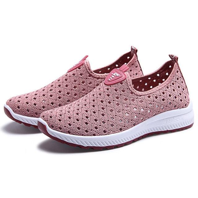 Stevvex pink perforated mesh slip-on sneakers pair with white cushioned sole and maroon outsole on Tampa Home & Garden Store