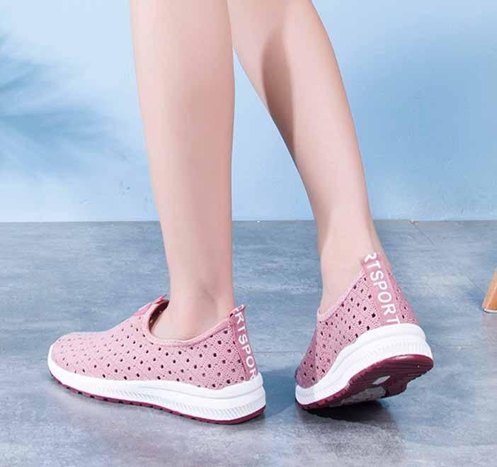 Stevvex women's pink perforated mesh slip-on sneakers pair with white sole on Tampa Home & Garden Store