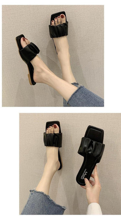 Stevvex black open-toe slide sandals with ruched pleated straps and flat sole pair on Tampa Home & Garden Store