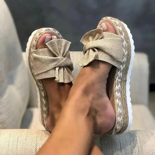 Stevvex tan woven bow sandals, casual non-slip pair with thick white sole on Tampa Home & Garden Store