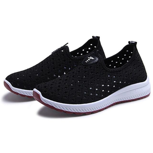 Stevvex black breathable mesh sneakers slip-on with white midsole and burgundy outsole on Tampa Home & Garden Store