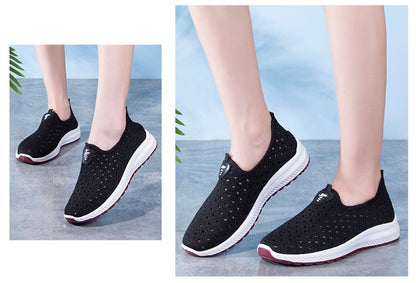 Stevvex breathable mesh sneakers pair in black with white midsole and pink outsole on Tampa Home & Garden Store