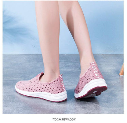 Breathable pink mesh slip-on sneakers for women with perforated upper and white sole on Tampa Home & Garden Store