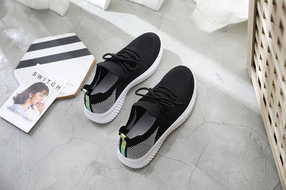 Stevvex black mesh sneakers pair with white sole and striped heel accents on Tampa Home & Garden Store