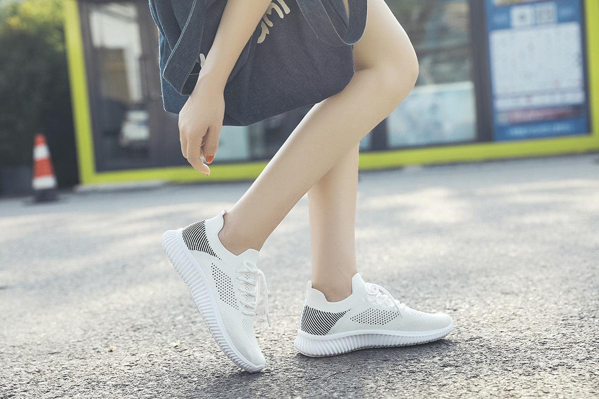 Women's Stevvex white mesh breathable sneakers with striped heel panel on Tampa Home & Garden Store
