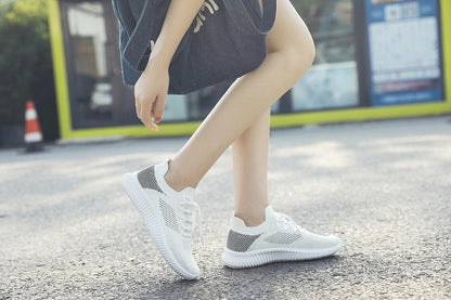 Women's Stevvex white mesh breathable sneakers with striped heel panel on Tampa Home & Garden Store