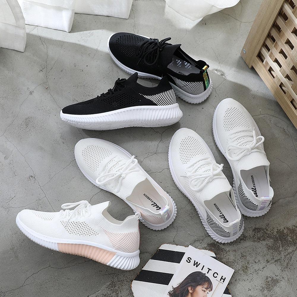 Summer Stevvex mesh breathable sneakers, white and black casual trainers, 5 pairs on display on Tampa Home & Garden Store