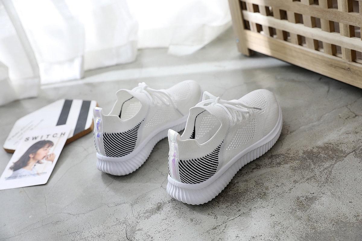 Stevvex white mesh sneakers with breathable knit upper and chunky sole on Tampa Home & Garden Store