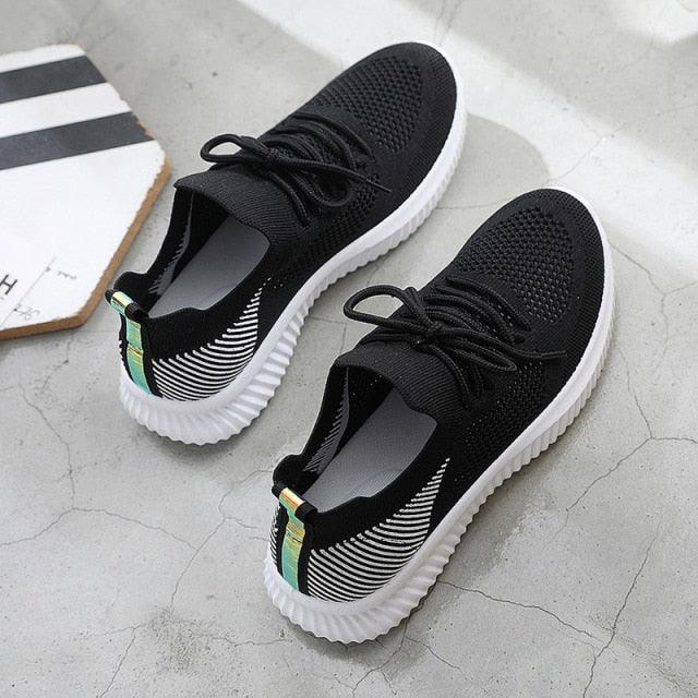 Stevvex mesh sneakers black knit upper white sole pair on Tampa Home & Garden Store
