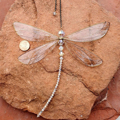 Stevvex dragonfly wind chime sun catcher with clear crystal wings and gold-tone frame on Tampa Home & Garden Store