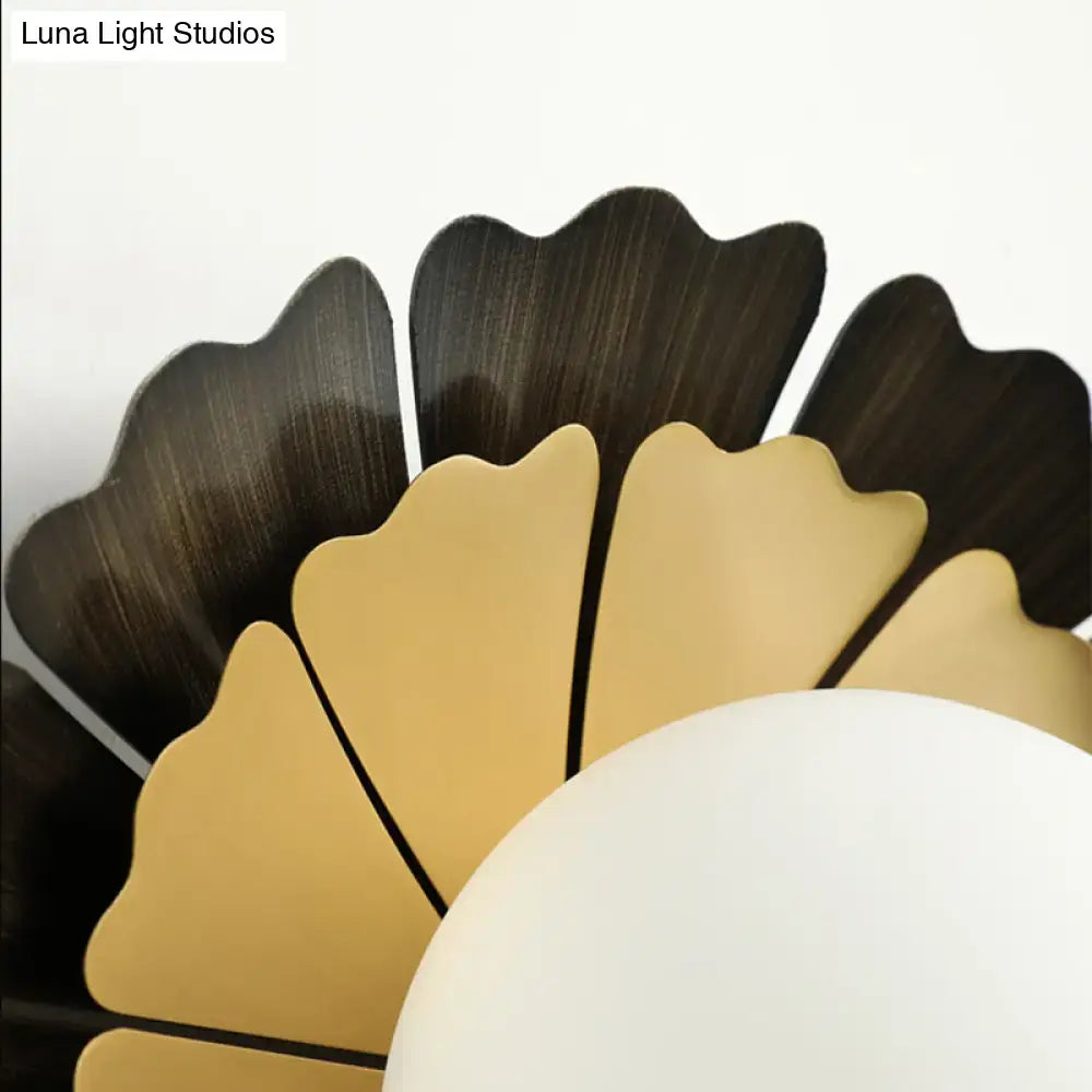 Yellow Wood Wall Sconce with gold and dark petal accents, leaf-style lamp on Tampa Home & Garden Store