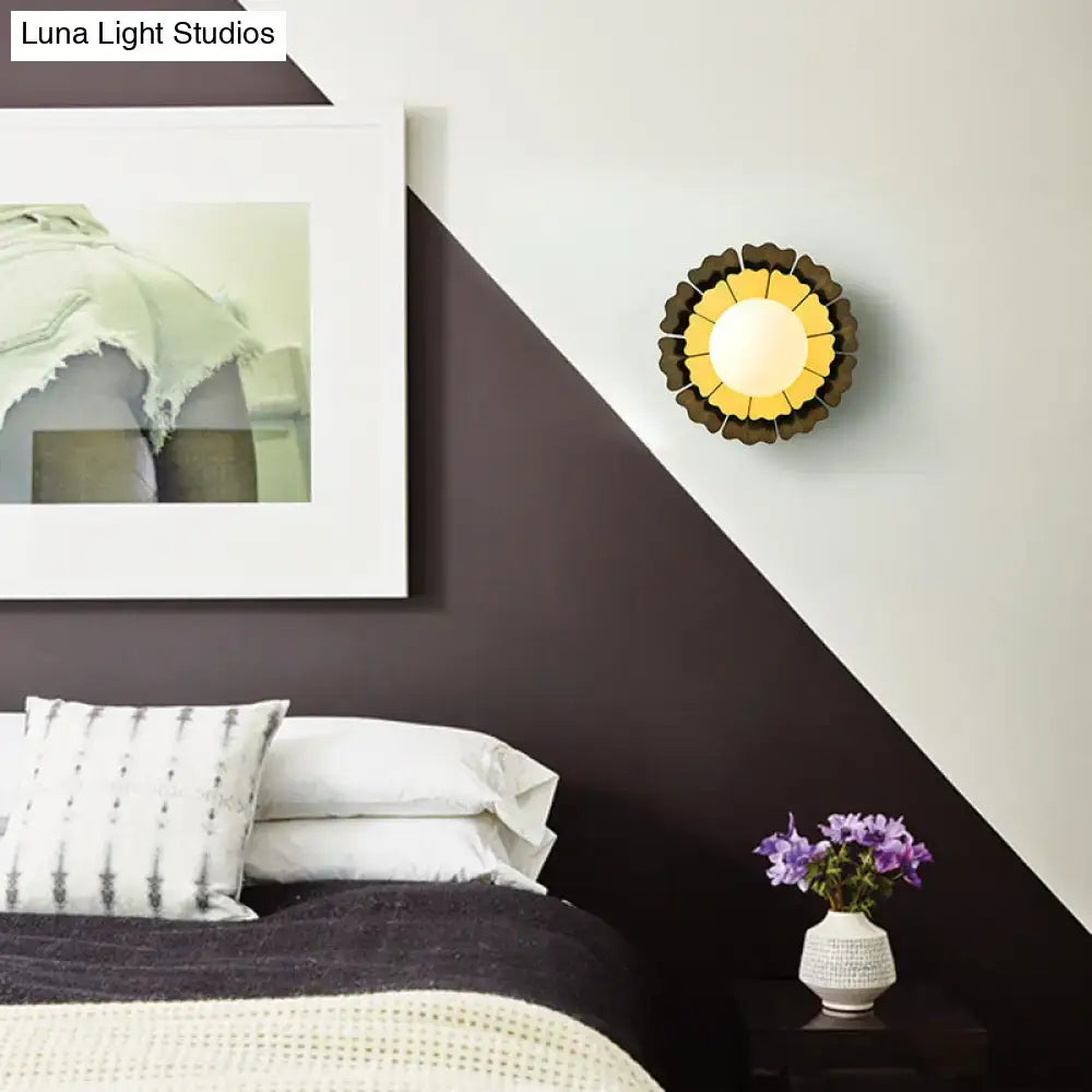 Yellow wood wall sconce by Decorbites, round sunburst wood petals for a warm accent on Tampa Home & Garden Store
