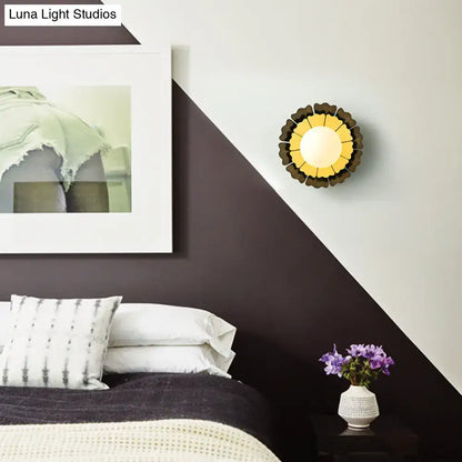 Yellow wood wall sconce by Decorbites, round sunburst wood petals for a warm accent on Tampa Home & Garden Store