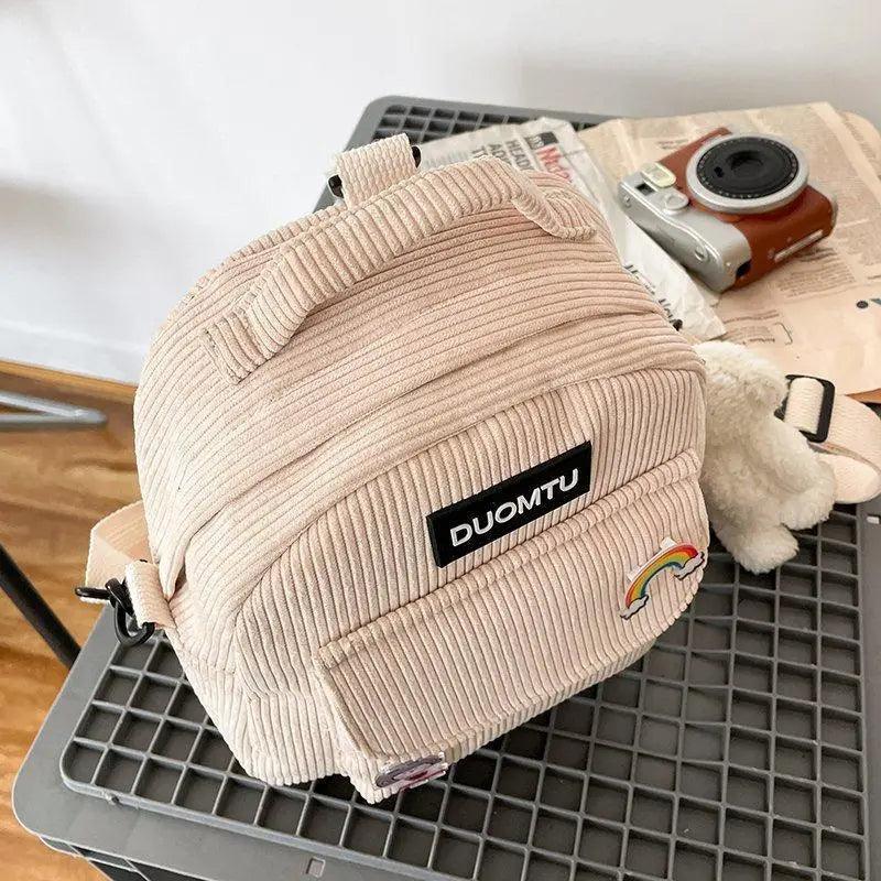 Stevvex small beige corduroy backpack with DUOMTU patch and rainbow badge for girls on Tampa Home & Garden Store