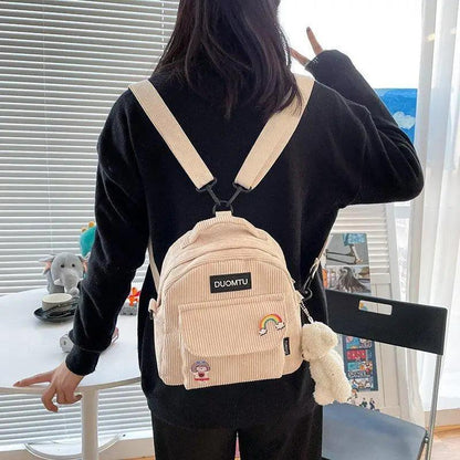 Beige corduroy mini backpack DUOMTU with front pocket and rainbow patch on Tampa Home & Garden Store