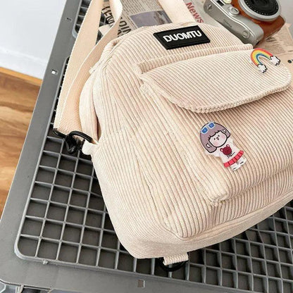 Beige corduroy mini backpack with patches and DUOMTU logo, Stevvex ALU11080FEP girls backpack on Tampa Home & Garden Store